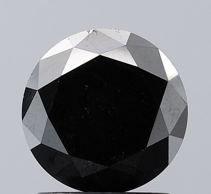 Loose Diamond - ROUND 1.77ct Fancy Black VS2: Loose Diamond - ROUND 1.77ct Fancy Black VS2 Source: Natural Shape: ROUND Carats: 1.77 Color: Fancy Black Certification: NONE Video: