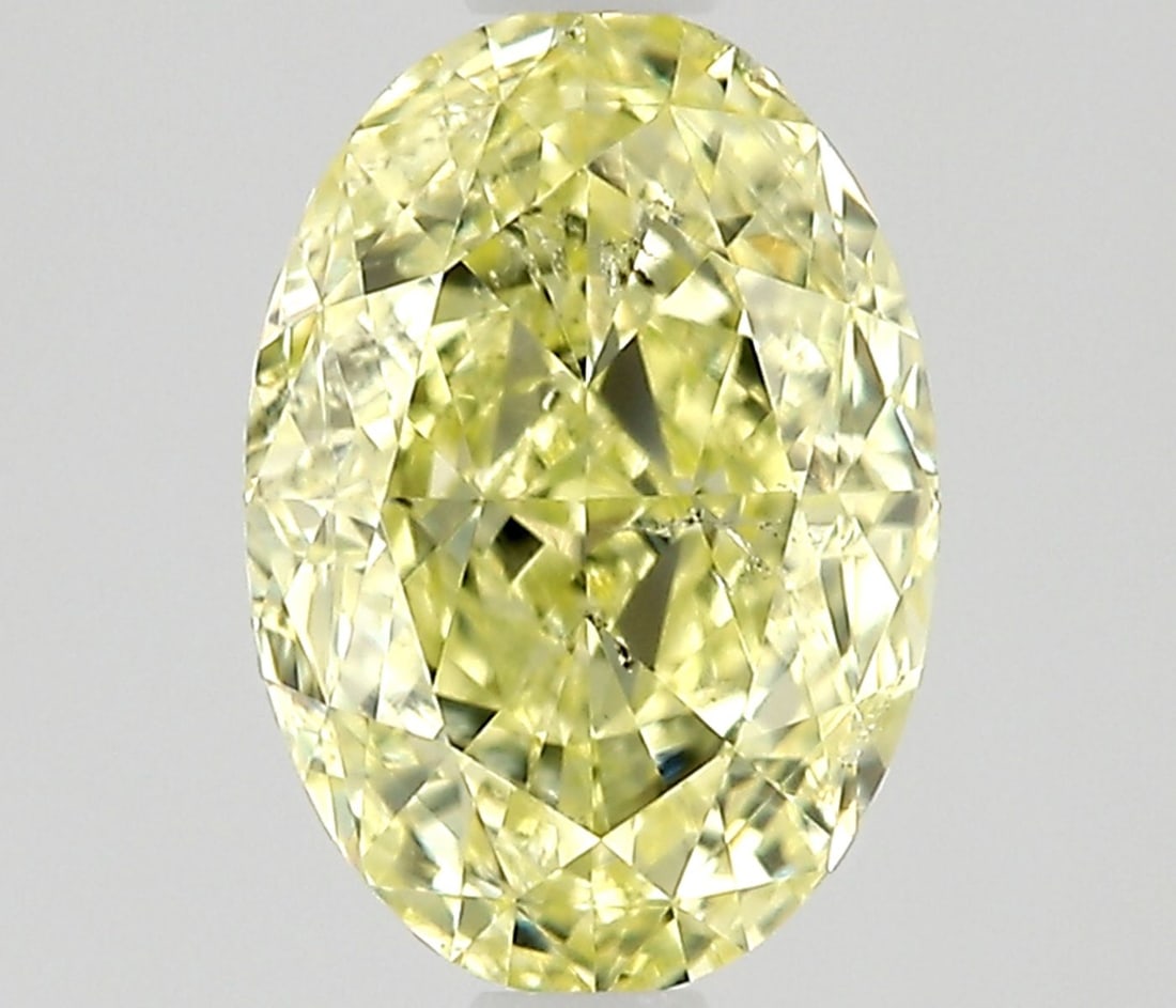 Loose Diamond - OVAL 0.71ct Fancy Yellow SI2: Loose Diamond - OVAL 0.71ct Fancy Yellow SI2 Source: Natural Shape: OVAL Carats: 0.71 Color: Fancy Yellow Certification: GIA Video:
