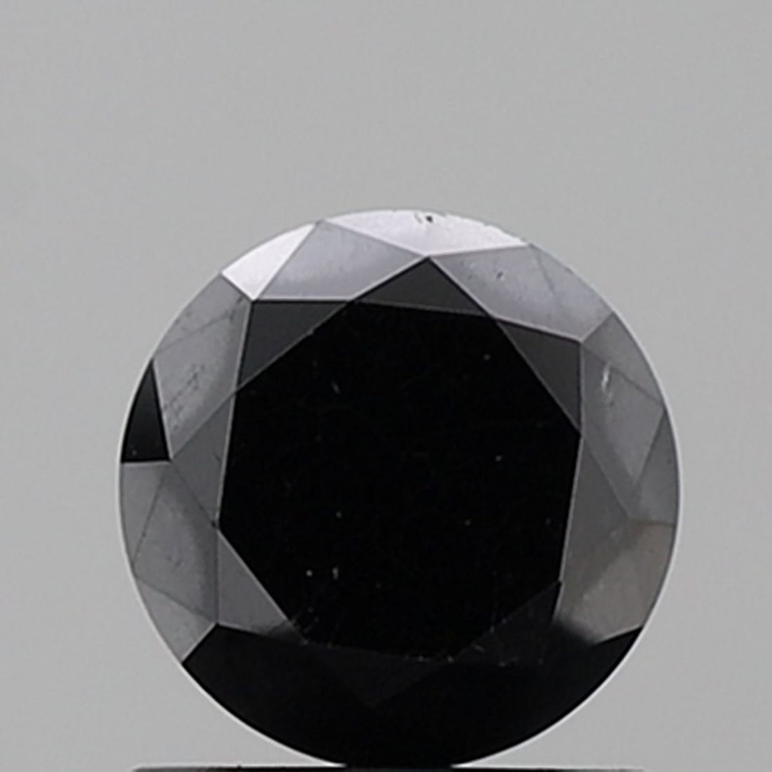 Loose Diamond - ROUND 1.23ct Fancy Black VVS2: Loose Diamond - ROUND 1.23ct Fancy Black VVS2 Source: Natural Shape: ROUND Carats: 1.23 Color: Fancy Black Certification: NONE Video: