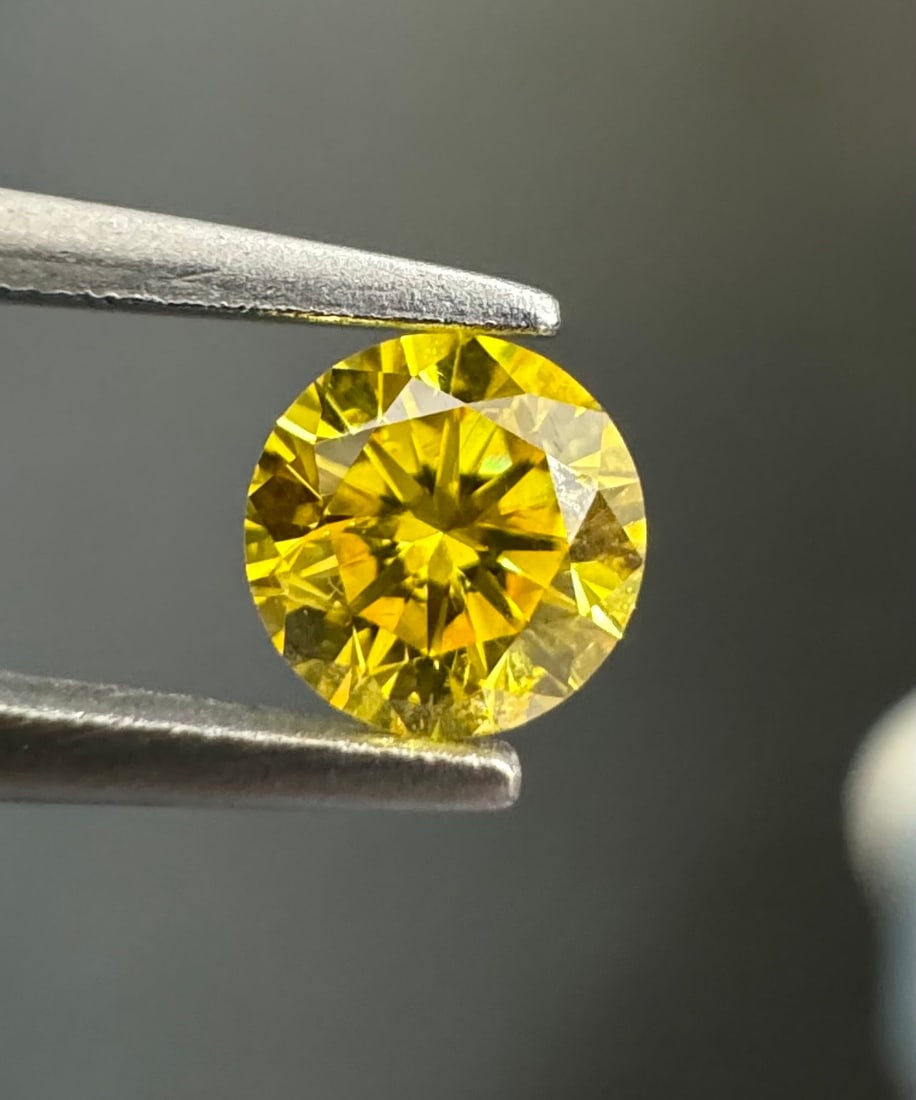 Loose Diamond - ROUND 0.27ct Fancy Vivid Yellow I2: Loose Diamond - ROUND 0.27ct Fancy Vivid Yellow I2 Source: Natural Shape: ROUND Carats: 0.27 Color: Fancy Vivid Yellow Certification: GIA Video: