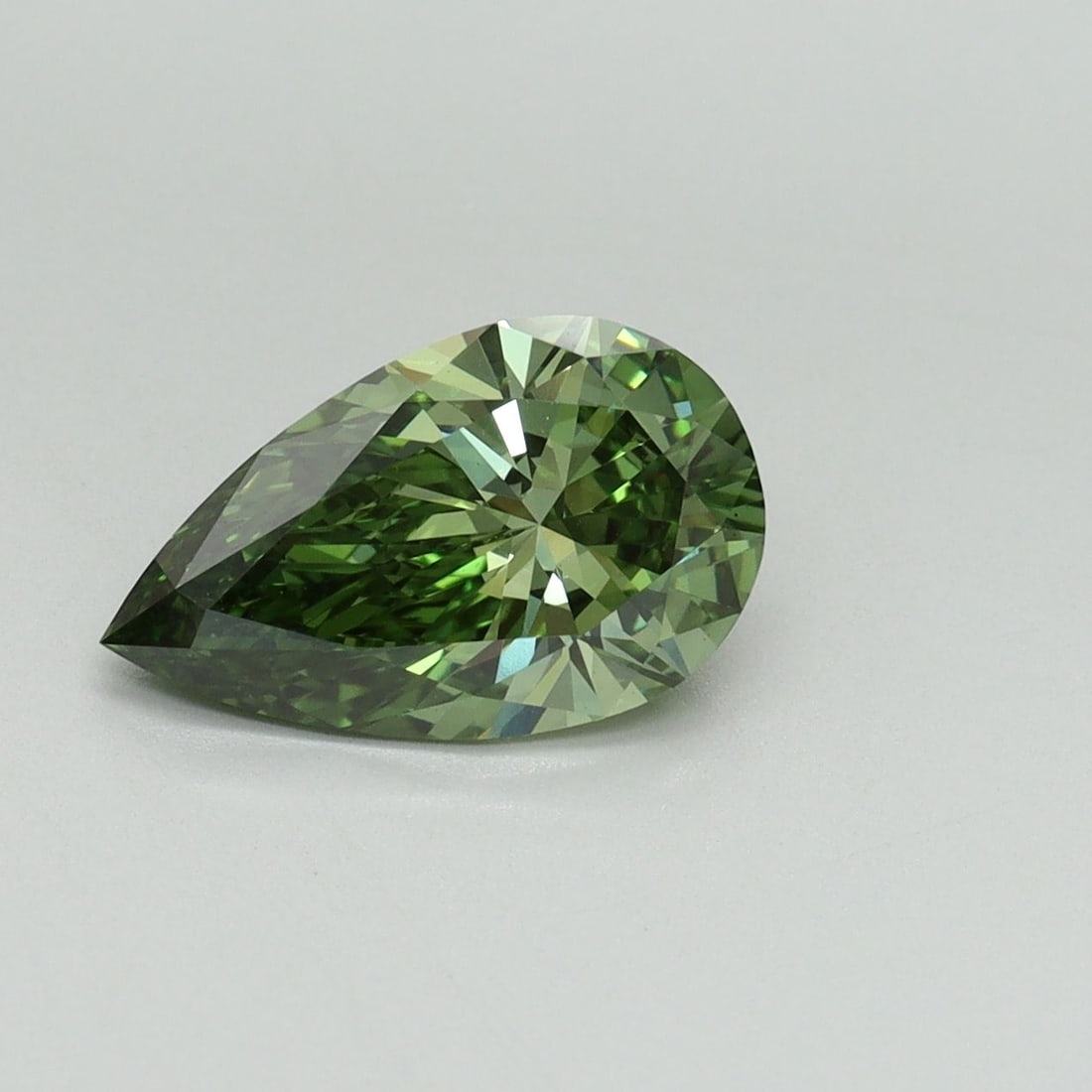Loose Diamond - PEAR 1.54ct Fancy Vivid Green VS1: Loose Diamond - PEAR 1.54ct Fancy Vivid Green VS1 Source: This is a real non-mined Diamond that has been grown in a lab Shape: PEAR Carats: 1.54 Color: Fancy Vivid Green Certification: IGI Video: