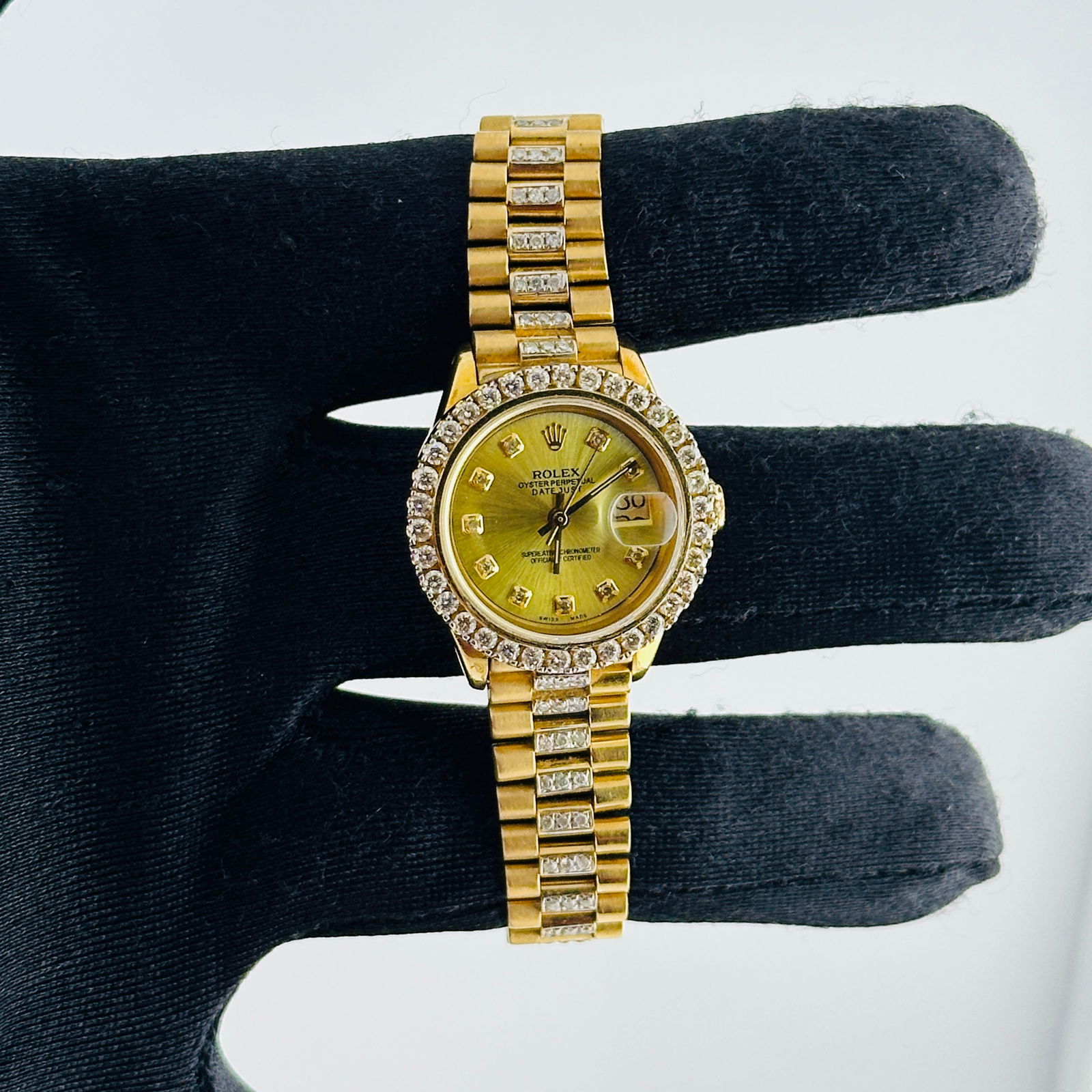 Ladies Aftermarket Red Diamond Dial President Watch With Diamonds Ref 6917: Ladies Aftermarket Red Diamond Dial President Watch With Diamonds Ref 6917 This ladies Rolex Datejust President features an Aftermarket red diamond dial, a diamond bezel, and an Aftermarket President
