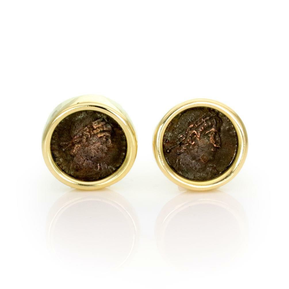 Constantino 18k Gold Roman Bronze Coin Earrings Post Omega Backs: Constantino 18k Gold Roman Bronze Coin Earrings Post Omega Backs Elevate your style with these exquisite Constantino earrings, beautifully crafted from 18k yellow gold. Each earring features a wide ro