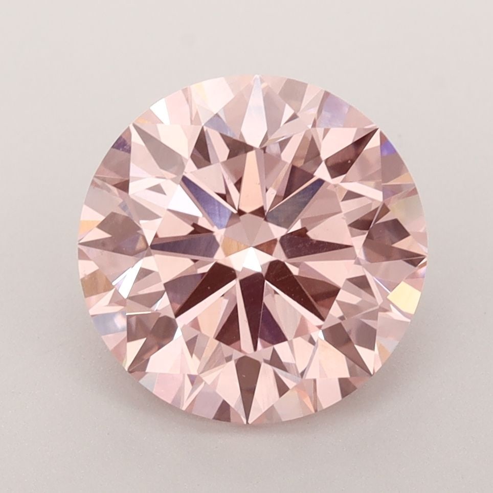 Ideal Loose Diamond - ROUND 3.4ct Fancy Vivid Pink VS1: Ideal Loose Diamond - ROUND 3.4ct Fancy Vivid Pink VS1 Source: This is a real non-mined Diamond that has been grown in a lab Shape: ROUND Carats: 3.4 Color: Fancy Vivid Pink Certification: IGI Video: