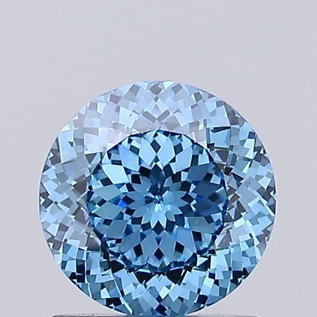 Loose Diamond - ROUND 0.91ct Fancy Vivid Blue VS2: Loose Diamond - ROUND 0.91ct Fancy Vivid Blue VS2 Source: This is a real non-mined Diamond that has been grown in a lab Shape: ROUND Carats: 0.91 Color: Fancy Vivid Blue Certification: IGI Video: