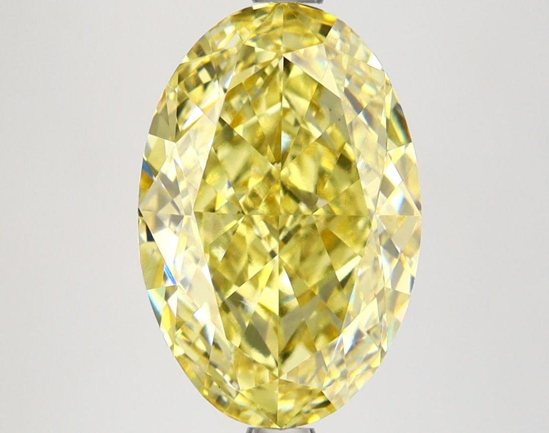 Loose Diamond - OVAL 4.16ct Fancy Vivid Yellow VS1: Loose Diamond - OVAL 4.16ct Fancy Vivid Yellow VS1 Source: This is a real non-mined Diamond that has been grown in a lab Shape: OVAL Carats: 4.16 Color: Fancy Vivid Yellow Certification: IGI Video: