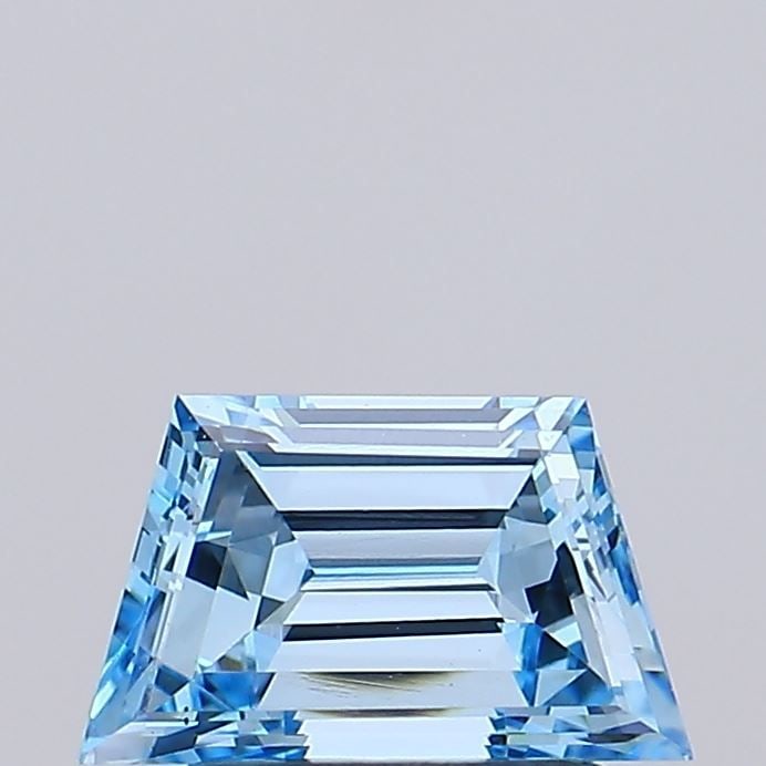 Loose Diamond - TRAPEZOID 0.98ct Fancy Vivid Blue VS1: Loose Diamond - TRAPEZOID 0.98ct Fancy Vivid Blue VS1 Source: This is a real non-mined Diamond that has been grown in a lab Shape: TRAPEZOID Carats: 0.98 Color: Fancy Vivid Blue Certification: NONE Vi