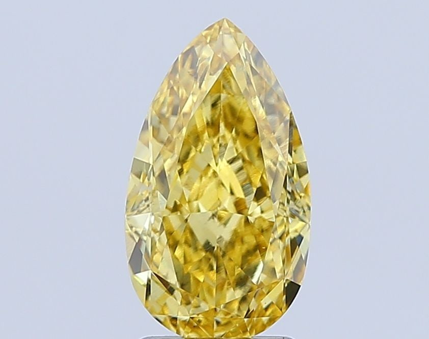 Loose Diamond - PEAR 2.38ct Fancy Vivid Yellow VS1: Loose Diamond - PEAR 2.38ct Fancy Vivid Yellow VS1 Source: This is a real non-mined Diamond that has been grown in a lab Shape: PEAR Carats: 2.38 Color: Fancy Vivid Yellow Certification: IGI Video:
