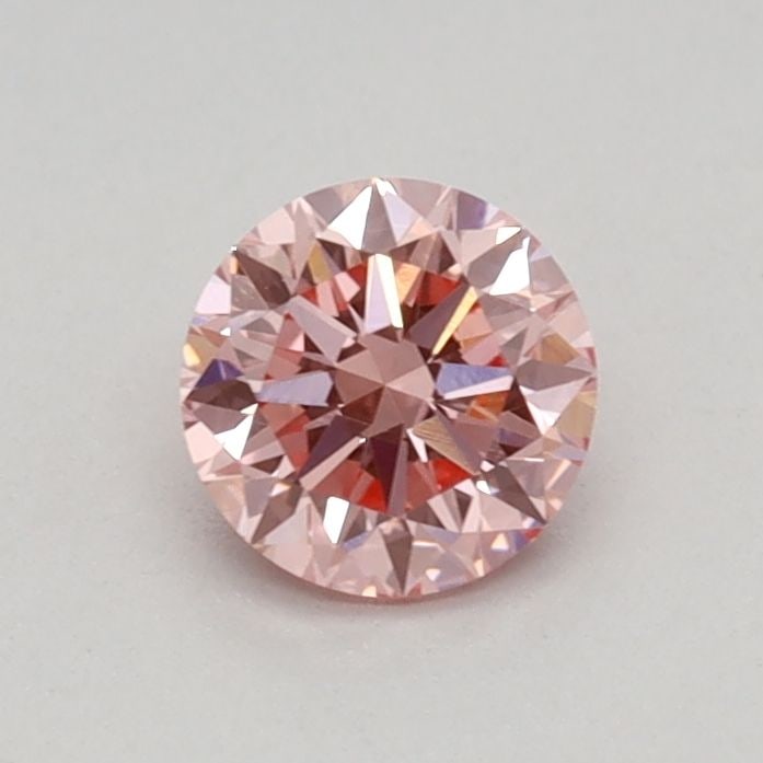 Loose Diamond - ROUND 0.4ct Fancy Vivid Pink VVS2: Loose Diamond - ROUND 0.4ct Fancy Vivid Pink VVS2 Source: This is a real non-mined Diamond that has been grown in a lab Shape: ROUND Carats: 0.4 Color: Fancy Vivid Pink Certification: IGI Video: