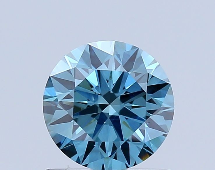 Loose Diamond - ROUND 0.84ct Fancy Vivid Blue VS1: Loose Diamond - ROUND 0.84ct Fancy Vivid Blue VS1 Source: This is a real non-mined Diamond that has been grown in a lab Shape: ROUND Carats: 0.84 Color: Fancy Vivid Blue Certification: NONE Video: