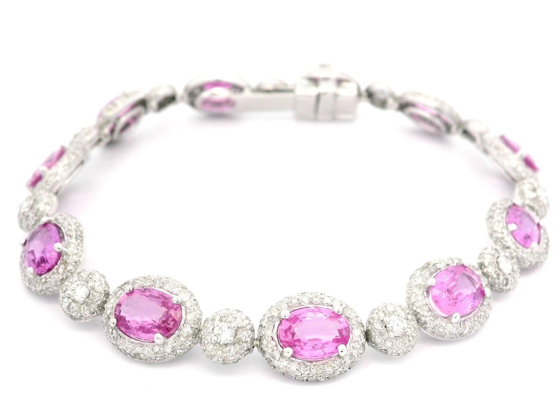 18k White Gold GIA Certified Pink Sapphire Diamond Bracelet 14ctw: 18k White Gold GIA Certified Pink Sapphire Diamond Bracelet 14ctw Discover elegance with this stunning bracelet crafted in solid 18k white gold. Featuring a captivating array of eleven natural genuine