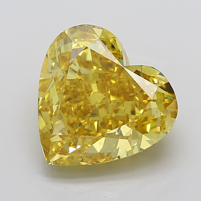 Loose Diamond - HEART 10.57ct Fancy Vivid Yellow VS2: Loose Diamond - HEART 10.57ct Fancy Vivid Yellow VS2 Source: This is a real non-mined Diamond that has been grown in a lab Shape: HEART Carats: 10.57 Color: Fancy Vivid Yellow Certification: IGI Video
