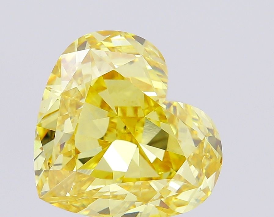 Loose Diamond - HEART 9.88ct Fancy Vivid Yellow VS1: Loose Diamond - HEART 9.88ct Fancy Vivid Yellow VS1 Source: This is a real non-mined Diamond that has been grown in a lab Shape: HEART Carats: 9.88 Color: Fancy Vivid Yellow Certification: IGI Video: