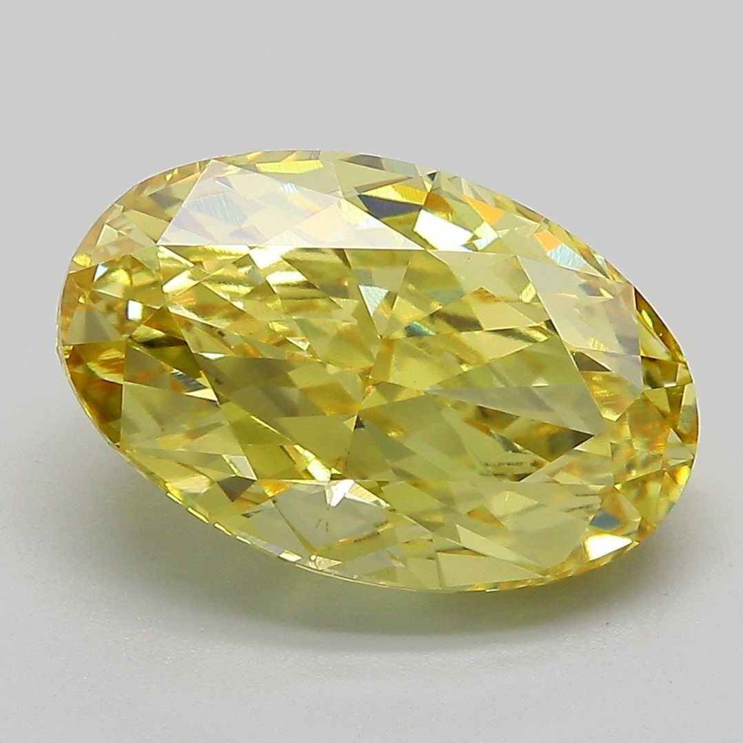 Loose Diamond - OVAL 5.08ct Fancy Vivid Yellow VS1: Loose Diamond - OVAL 5.08ct Fancy Vivid Yellow VS1 Source: This is a real non-mined Diamond that has been grown in a lab Shape: OVAL Carats: 5.08 Color: Fancy Vivid Yellow Certification: IGI Video: