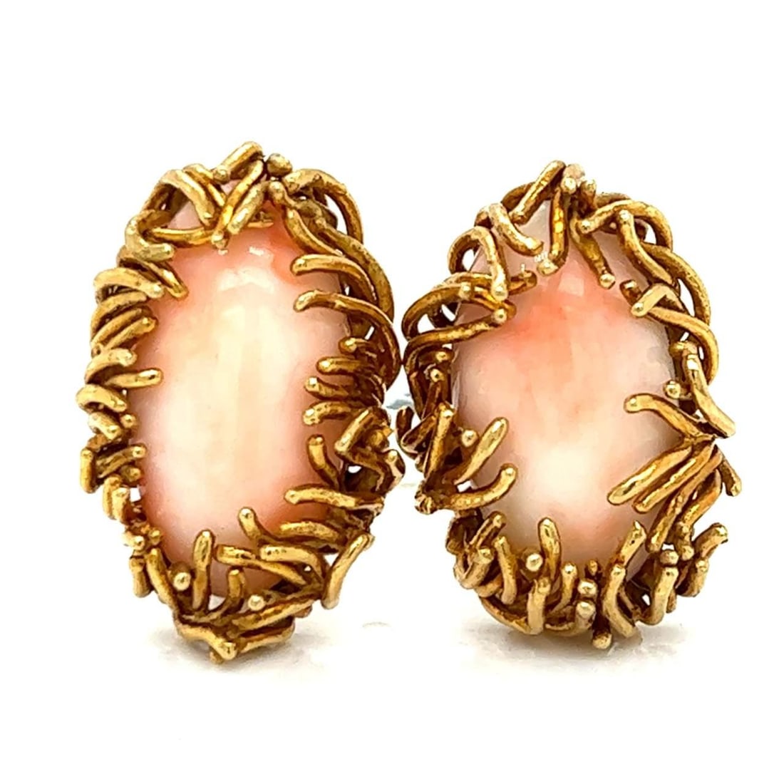Vintage 1960's 18K Yellow Gold Coral Earrings: Vintage 1960's 18K Yellow Gold Coral Earrings These stunning 1960's earrings feature a beautiful design crafted from 18K yellow gold, highlighting vibrant coral accents. Weighing 31.5 grams, these ear