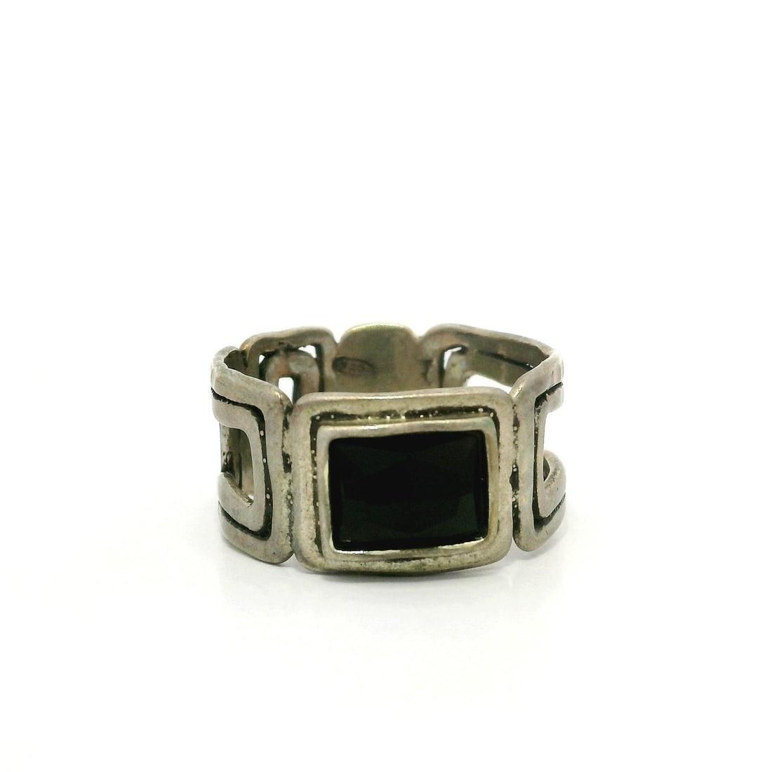 Handmade Sterling Silver Black Onyx Geometric Unisex Band Ring: Handmade Sterling Silver Black Onyx Geometric Unisex Band Ring This stunning Handmade Sterling Silver Faceted Black Onyx Open Geometric Unisex Band Ring showcases a sleek and modern design. Featuring