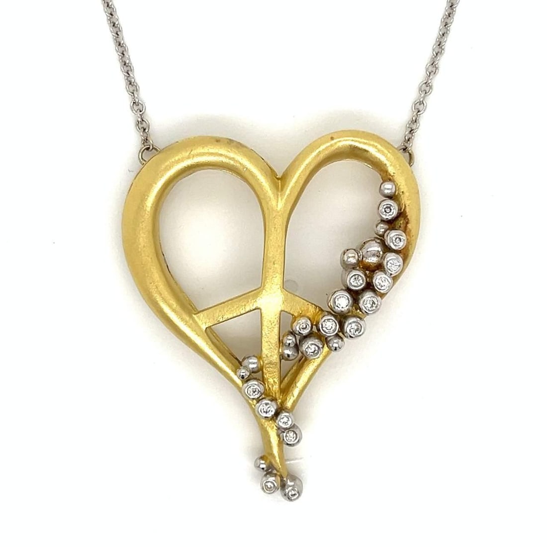 18K Yellow Gold Heart Pendant with 18 Diamonds 0.50 Ct: 18K Yellow Gold Heart Pendant with 18 Diamonds 0.50 Ct This stunning 18K Yellow Gold heart pendant and chain features a total of 18 diamonds, weighing approximately 0.50 carats with H-J color and VS1-