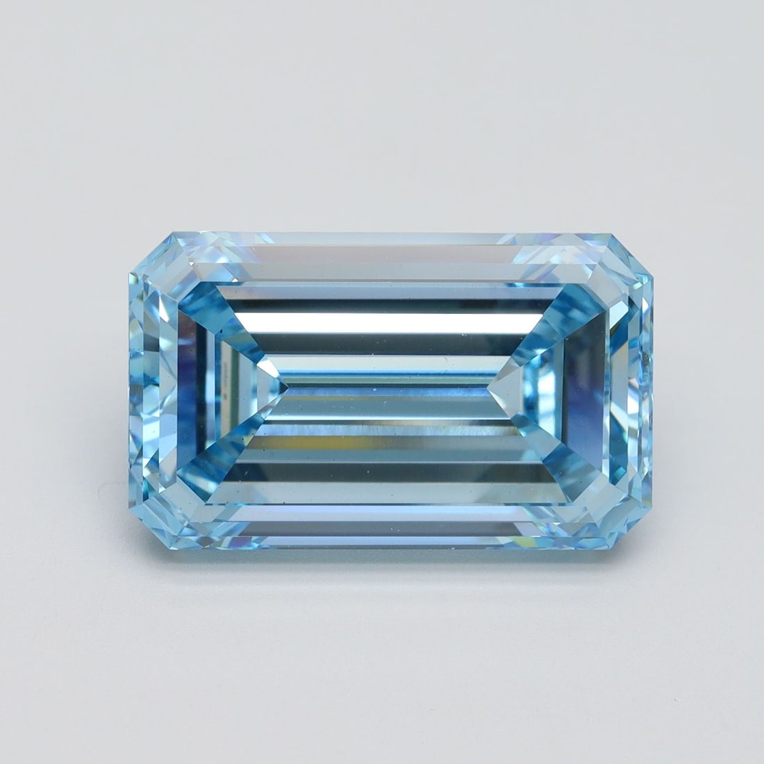 Loose Diamond - EMERALD 9.54ct Fancy Vivid Blue VS2: Loose Diamond - EMERALD 9.54ct Fancy Vivid Blue VS2 Source: This is a real non-mined Diamond that has been grown in a lab Shape: EMERALD Carats: 9.54 Color: Fancy Vivid Blue Certification: IGI Video: