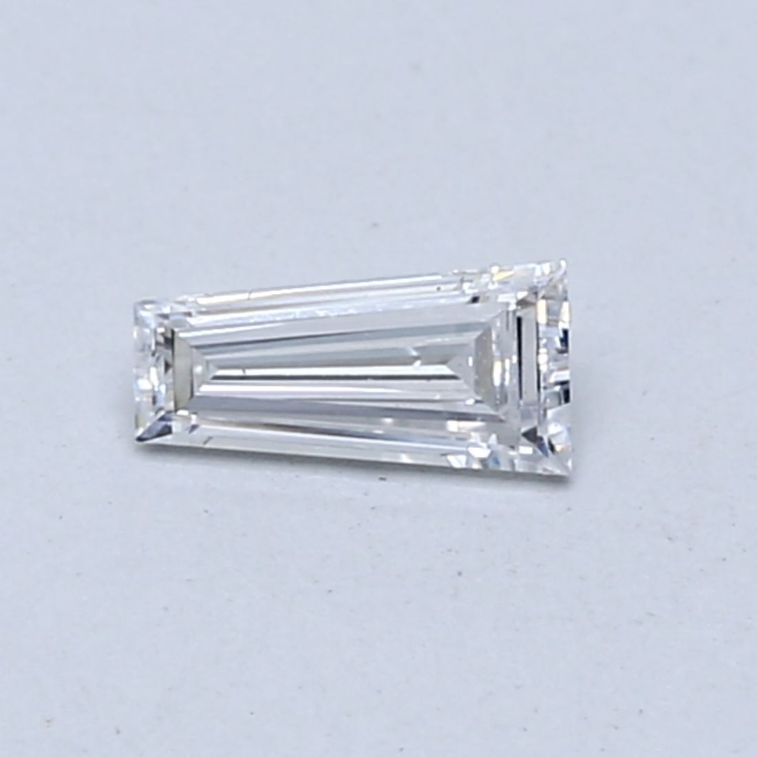 Loose Diamond - TAPERED BAGUETTE 0.24ct F VS1: Loose Diamond - TAPERED BAGUETTE 0.24ct F VS1 Source: This is a real non-mined Diamond that has been grown in a lab Shape: TAPERED BAGUETTE Carats: 0.24 Color: F Clarity: VS1 Certification: NONE The D