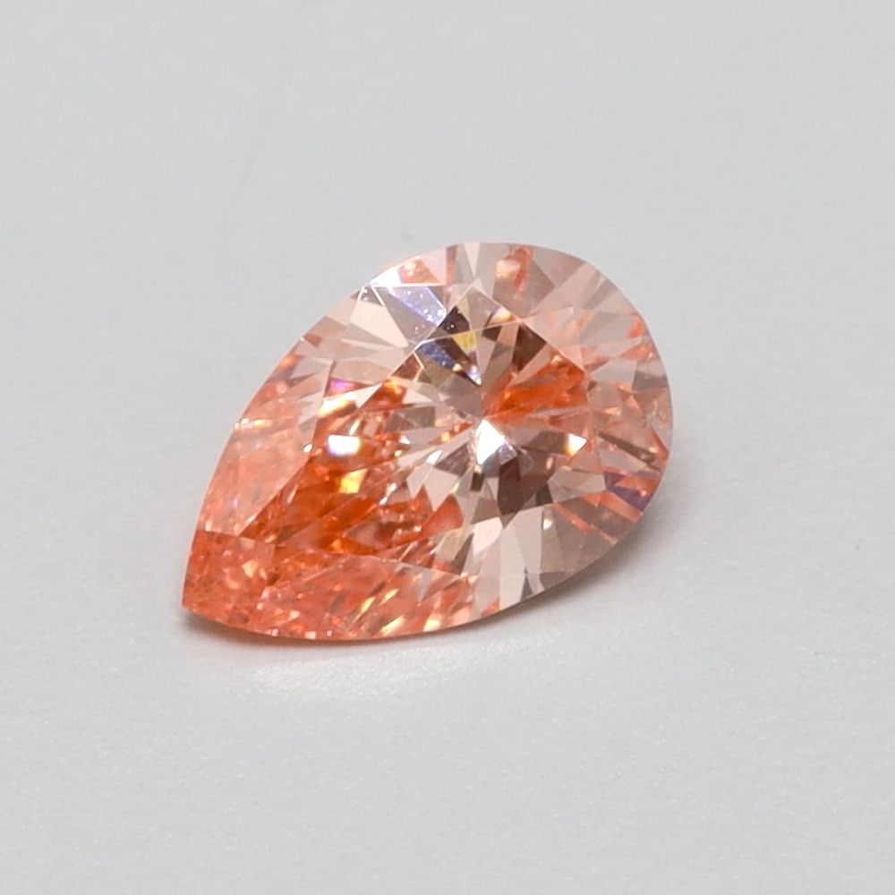 Loose Diamond - PEAR 0.19ct Fancy Vivid Orangey Pink VS1: Loose Diamond - PEAR 0.19ct Fancy Vivid Orangey Pink VS1 Source: This is a real non-mined Diamond that has been grown in a lab Shape: PEAR Carats: 0.19 Color: Fancy Vivid Orangey Pink Certification: N