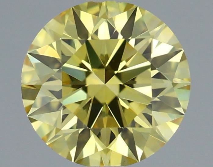 Ideal Loose Diamond - ROUND 0.65ct Fancy Vivid Yellow VVS2: Ideal Loose Diamond - ROUND 0.65ct Fancy Vivid Yellow VVS2 Source: This is a real non-mined Diamond that has been grown in a lab Shape: ROUND Carats: 0.65 Color: Fancy Vivid Yellow Certification: IGI