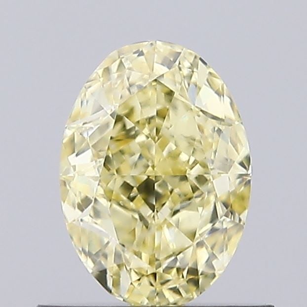 Loose Diamond - OVAL 0.84ct Fancy Intense Yellow VS1: Loose Diamond - OVAL 0.84ct Fancy Intense Yellow VS1 Source: This is a real non-mined Diamond that has been grown in a lab Shape: OVAL Carats: 0.84 Color: Fancy Intense Yellow Certification: IGI Video