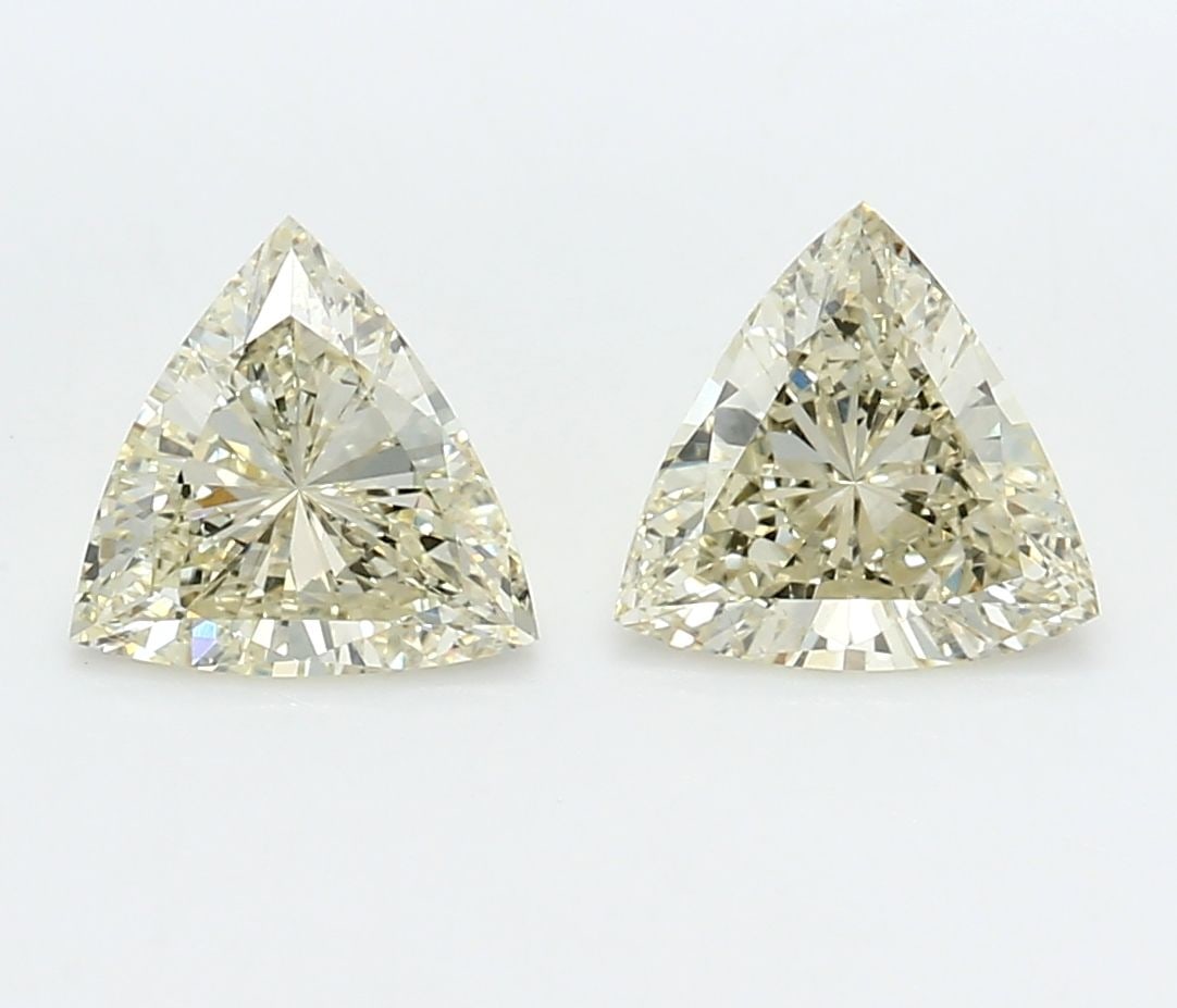 Loose Diamond - TRIANGULAR 1.61ct Yellow VVS2: Loose Diamond - TRIANGULAR 1.61ct Yellow VVS2 Source: This is a real non-mined Diamond that has been grown in a lab Shape: TRIANGULAR Carats: 1.61 Color: Yellow Certification: NONE Video: