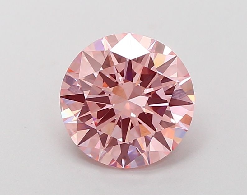 Loose Diamond - ROUND 1.99ct Fancy Vivid Pink VS1: Loose Diamond - ROUND 1.99ct Fancy Vivid Pink VS1 Source: This is a real non-mined Diamond that has been grown in a lab Shape: ROUND Carats: 1.99 Color: Fancy Vivid Pink Certification: IGI Video: