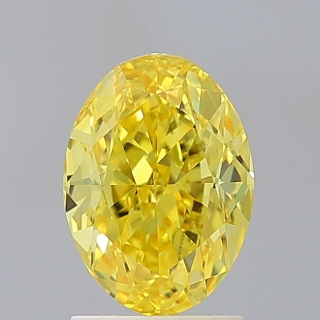 Loose Diamond - OVAL 2.2ct Fancy Vivid Yellow VS1: Loose Diamond - OVAL 2.2ct Fancy Vivid Yellow VS1 Source: This is a real non-mined Diamond that has been grown in a lab Shape: OVAL Carats: 2.2 Color: Fancy Vivid Yellow Certification: IGI Video:
