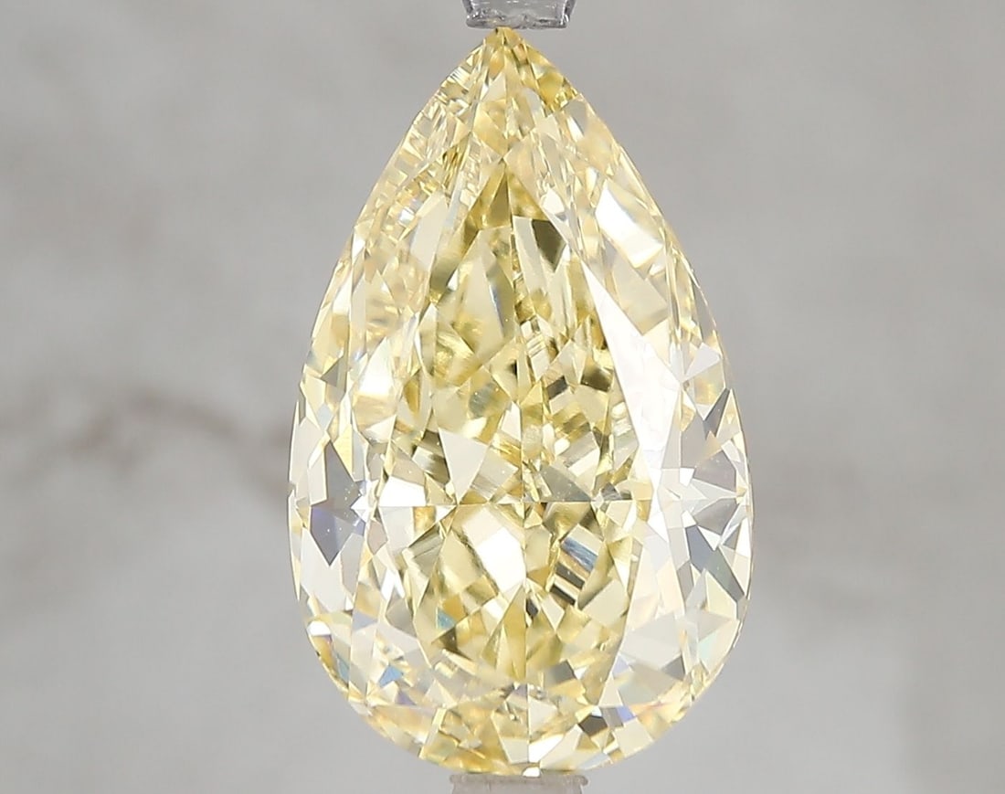 Loose Diamond - PEAR 5.07ct Fancy Vivid Yellow VVS2: Loose Diamond - PEAR 5.07ct Fancy Vivid Yellow VVS2 Source: This is a real non-mined Diamond that has been grown in a lab Shape: PEAR Carats: 5.07 Color: Fancy Vivid Yellow Certification: IGI Video: