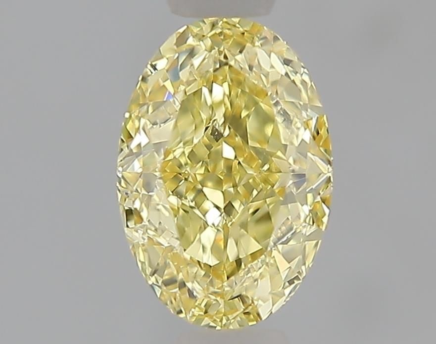 Loose Diamond - OVAL 1.07ct Fancy Yellow VVS2: Loose Diamond - OVAL 1.07ct Fancy Yellow VVS2 Source: This is a real non-mined Diamond that has been grown in a lab Shape: OVAL Carats: 1.07 Color: Fancy Yellow Certification: IGI Video: