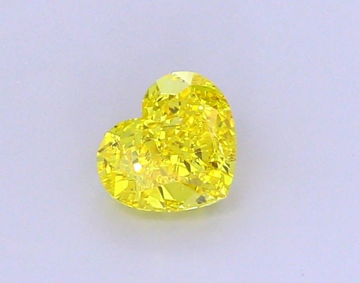 Loose Diamond - HEART 1.54ct Fancy Vivid Yellow VS2: Loose Diamond - HEART 1.54ct Fancy Vivid Yellow VS2 Source: This is a real non-mined Diamond that has been grown in a lab Shape: HEART Carats: 1.54 Color: Fancy Vivid Yellow Certification: IGI Video:
