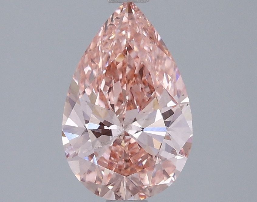 Loose Diamond - PEAR 1.52ct Fancy Vivid Pink SI1: Loose Diamond - PEAR 1.52ct Fancy Vivid Pink SI1 Source: This is a real non-mined Diamond that has been grown in a lab Shape: PEAR Carats: 1.52 Color: Fancy Vivid Pink Certification: IGI Video: