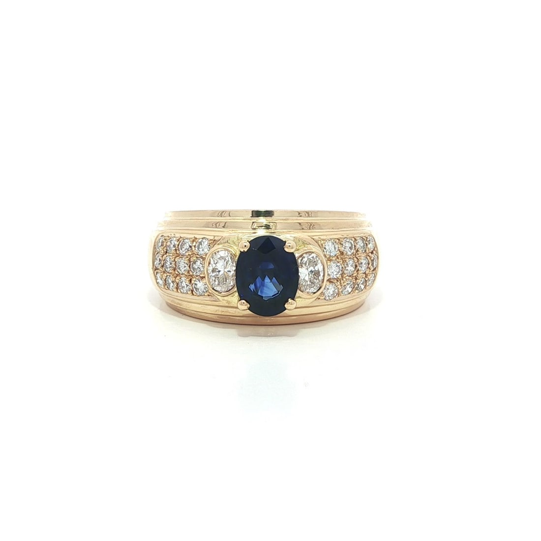 18k Yellow Gold Wide Band with Oval Sapphire and Pave Diamond Accents Vintage Ring: 18k Yellow Gold Wide Band with Oval Sapphire and Pave Diamond Accents Vintage Ring This vintage wide band ring is crafted from solid 18k yellow gold and features a striking oval-cut natural sapphire w