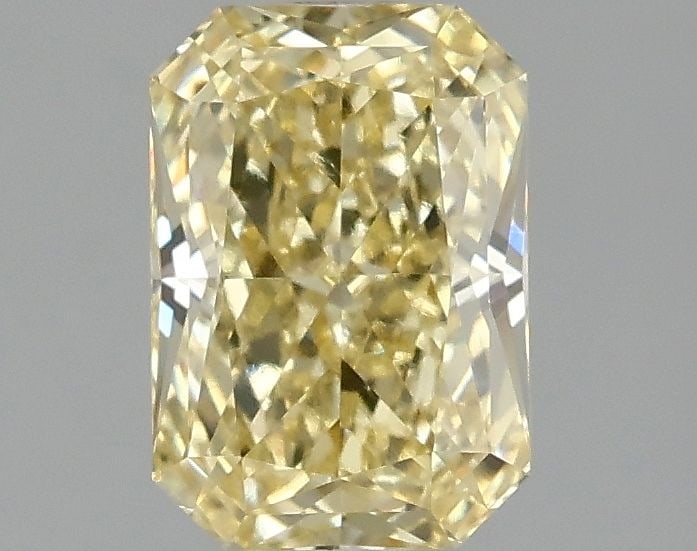 Loose Diamond - RADIANT 1.56ct Fancy Vivid Yellow VS1: Loose Diamond - RADIANT 1.56ct Fancy Vivid Yellow VS1 Source: This is a real non-mined Diamond that has been grown in a lab Shape: RADIANT Carats: 1.56 Color: Fancy Vivid Yellow Certification: IGI Vid