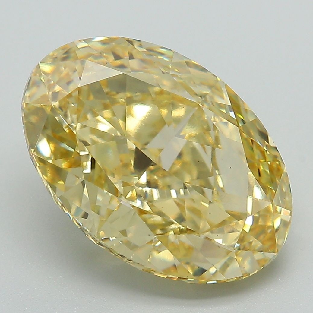 Loose Diamond - OVAL 7.15ct Fancy Vivid Yellow VS1: Loose Diamond - OVAL 7.15ct Fancy Vivid Yellow VS1 Source: This is a real non-mined Diamond that has been grown in a lab Shape: OVAL Carats: 7.15 Color: Fancy Vivid Yellow Certification: IGI Video: