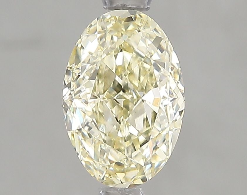 Loose Diamond - OVAL 1.52ct Fancy Yellow VS1: Loose Diamond - OVAL 1.52ct Fancy Yellow VS1 Source: This is a real non-mined Diamond that has been grown in a lab Shape: OVAL Carats: 1.52 Color: Fancy Yellow Certification: IGI Video: