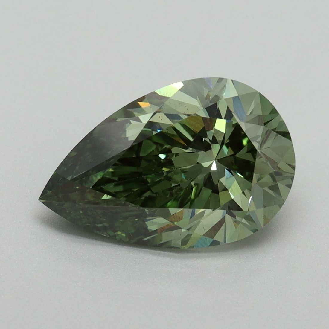 Loose Diamond - PEAR 3.0ct Fancy Vivid Green VS2: Loose Diamond - PEAR 3.0ct Fancy Vivid Green VS2 Source: This is a real non-mined Diamond that has been grown in a lab Shape: PEAR Carats: 3.0 Color: Fancy Vivid Green Certification: IGI Video: