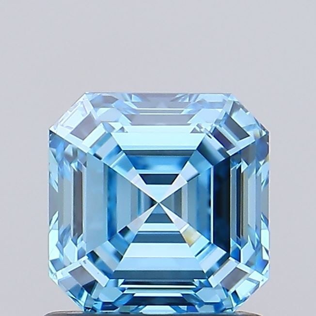 Loose Diamond - ASSCHER 1.01ct Fancy Vivid Blue VS1: Loose Diamond - ASSCHER 1.01ct Fancy Vivid Blue VS1 Source: This is a real non-mined Diamond that has been grown in a lab Shape: ASSCHER Carats: 1.01 Color: Fancy Vivid Blue Certification: IGI Video: