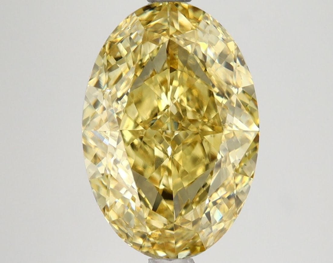 Loose Diamond - OVAL 4.16ct Fancy Vivid Yellow VS1: Loose Diamond - OVAL 4.16ct Fancy Vivid Yellow VS1 Source: This is a real non-mined Diamond that has been grown in a lab Shape: OVAL Carats: 4.16 Color: Fancy Vivid Yellow Certification: IGI Video: