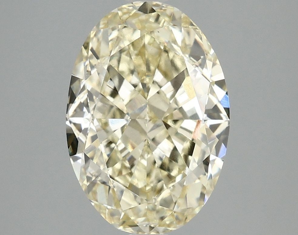 Loose Diamond - OVAL 4.0ct Fancy Yellow VS1: Loose Diamond - OVAL 4.0ct Fancy Yellow VS1 Source: This is a real non-mined Diamond that has been grown in a lab Shape: OVAL Carats: 4.0 Color: Fancy Yellow Certification: IGI Video: