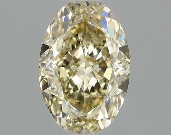 Loose Diamond - OVAL 1.52ct Fancy Yellow VS1: Loose Diamond - OVAL 1.52ct Fancy Yellow VS1 Source: This is a real non-mined Diamond that has been grown in a lab Shape: OVAL Carats: 1.52 Color: Fancy Yellow Certification: IGI Video: