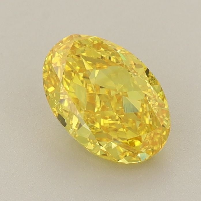 Loose Diamond - OVAL 1.03ct Fancy Vivid Yellow VVS2: Loose Diamond - OVAL 1.03ct Fancy Vivid Yellow VVS2 Source: This is a real non-mined Diamond that has been grown in a lab Shape: OVAL Carats: 1.03 Color: Fancy Vivid Yellow Certification: IGI Video: