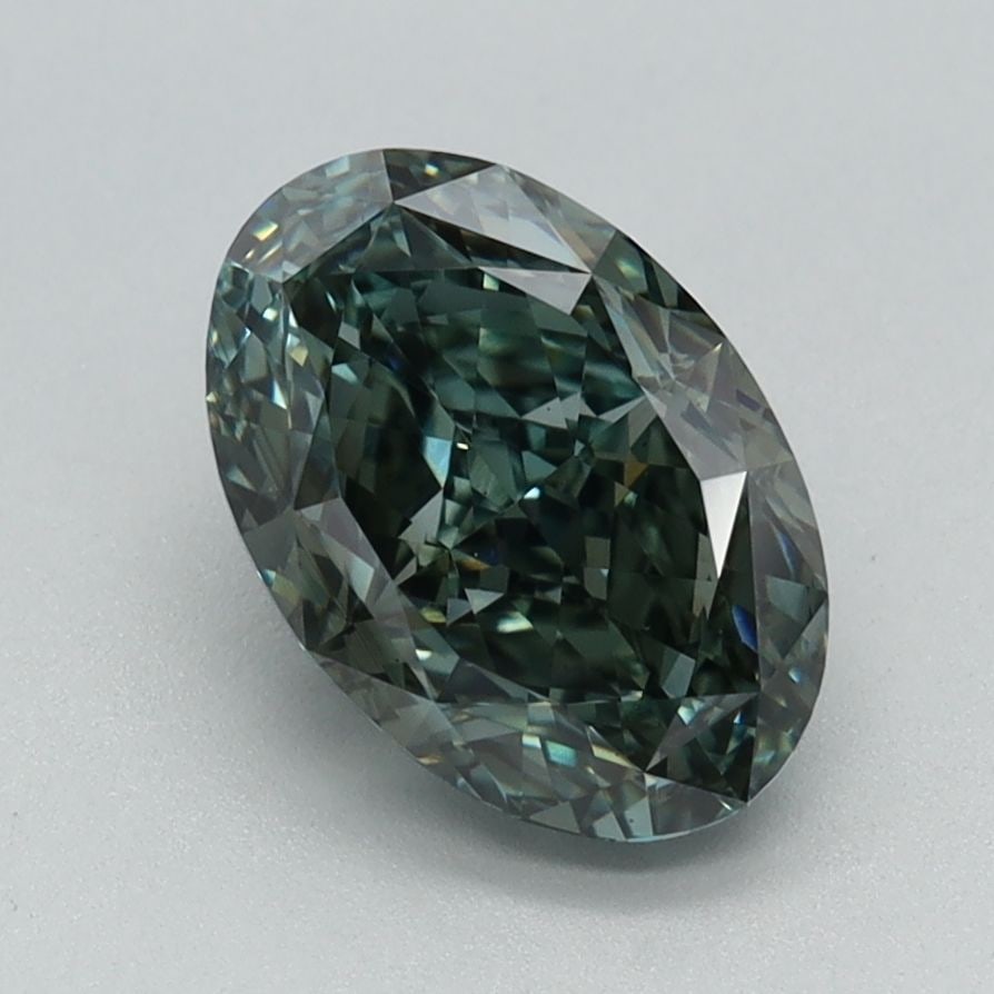 Loose Diamond - OVAL 1.62ct Fancy Vivid Gray Green VS2: Loose Diamond - OVAL 1.62ct Fancy Vivid Gray Green VS2 Source: This is a real non-mined Diamond that has been grown in a lab Shape: OVAL Carats: 1.62 Color: Fancy Vivid Gray Green Certification: IGI V