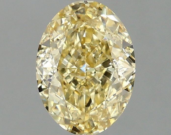 Loose Diamond - OVAL 1.57ct Fancy Vivid Yellow VVS2: Loose Diamond - OVAL 1.57ct Fancy Vivid Yellow VVS2 Source: This is a real non-mined Diamond that has been grown in a lab Shape: OVAL Carats: 1.57 Color: Fancy Vivid Yellow Certification: IGI Video: