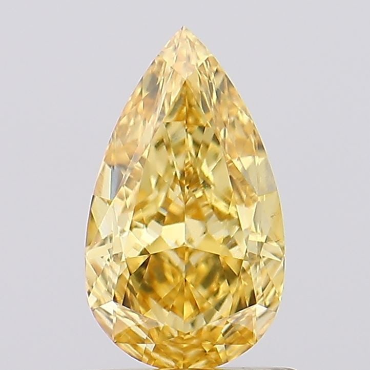 Loose Diamond - PEAR 1.03ct Fancy Vivid Yellow VS1: Loose Diamond - PEAR 1.03ct Fancy Vivid Yellow VS1 Source: This is a real non-mined Diamond that has been grown in a lab Shape: PEAR Carats: 1.03 Color: Fancy Vivid Yellow Certification: IGI Video: