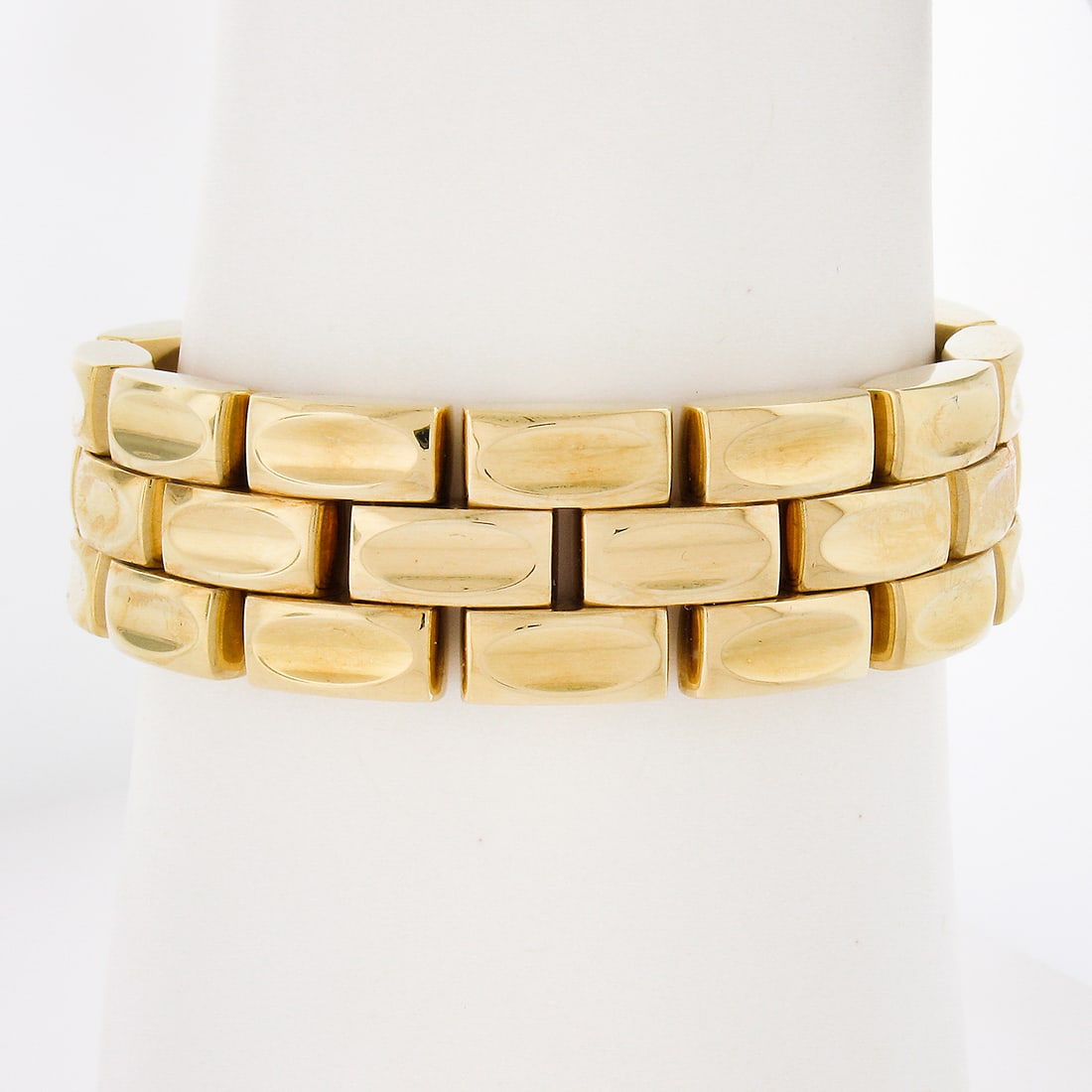 18k Rose Yellow Gold Reversible 3 Row Bracelet 18.5mm Wide: 18k Rose Yellow Gold Reversible 3 Row Bracelet 18.5mm Wide This exquisite reversible bracelet is crafted from solid 18k yellow gold with elegant rose gold accents. It features a unique design with thr