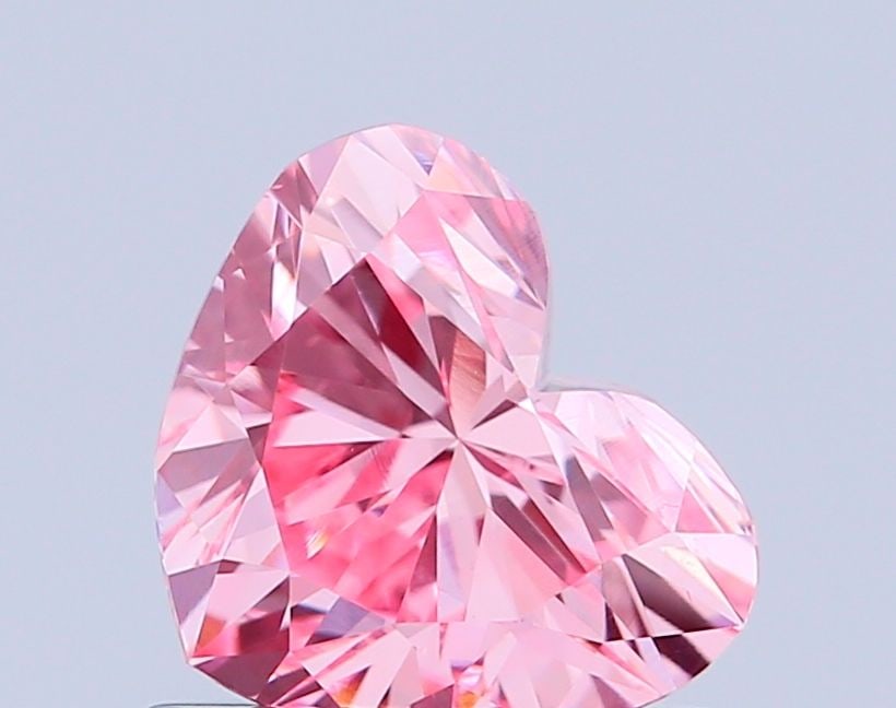Loose Diamond - HEART 0.79ct Fancy Vivid Pink VS1: Loose Diamond - HEART 0.79ct Fancy Vivid Pink VS1 Source: This is a real non-mined Diamond that has been grown in a lab Shape: HEART Carats: 0.79 Color: Fancy Vivid Pink Certification: IGI Video: