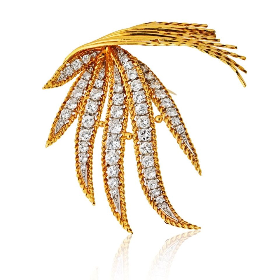 Sterle Paris Montreaux Brooch in Platinum and 18K Yellow Gold with 5 Carats Diamonds: Sterle Paris Montreaux Brooch in Platinum and 18K Yellow Gold with 5 Carats Diamonds This exquisite brooch features a stunning combination of platinum and 18K yellow gold, showcasing a luxurious desig
