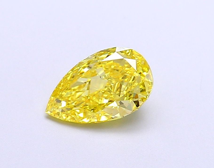 Loose Diamond - PEAR 1.07ct Fancy Vivid Yellow VS1: Loose Diamond - PEAR 1.07ct Fancy Vivid Yellow VS1 Source: This is a real non-mined Diamond that has been grown in a lab Shape: PEAR Carats: 1.07 Color: Fancy Vivid Yellow Certification: IGI Video: